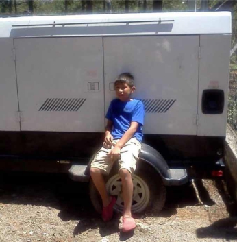 Winter 2015 - Honduran boy with generator
